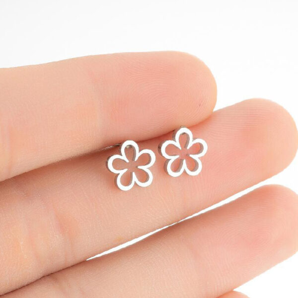 Delicate Stainless Steel Hollow Daisy Earrings: Stylish Silver Flower Studs for Women and Girls, Perfect Jewelry Gift - Image 4