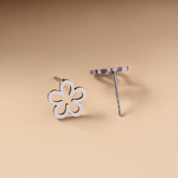 Delicate Stainless Steel Hollow Daisy Earrings: Stylish Silver Flower Studs for Women and Girls, Perfect Jewelry Gift - Image 3